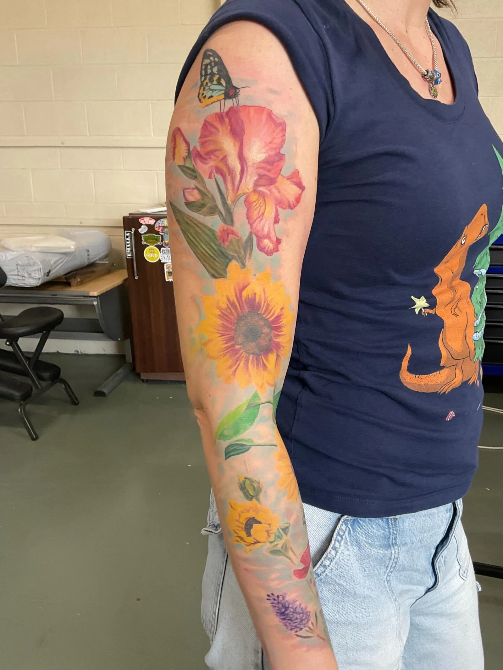 Full sleeve with sunflowers and hibiscus in vibrant colour